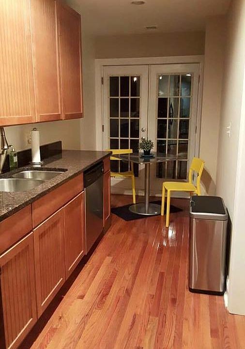 Kitchen features new dishwasher and garbage disposal.