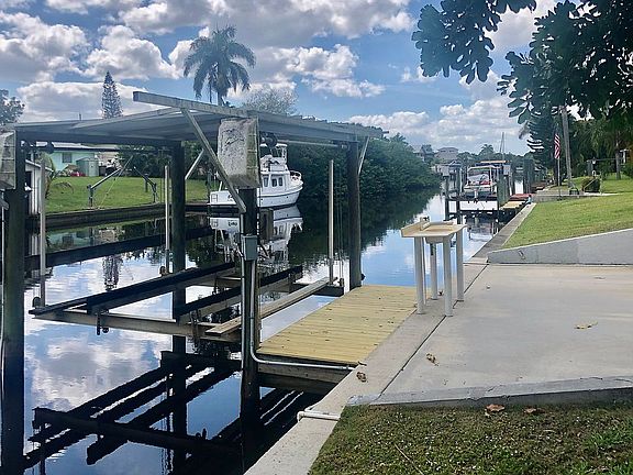 Patio, deck and boat lift. 