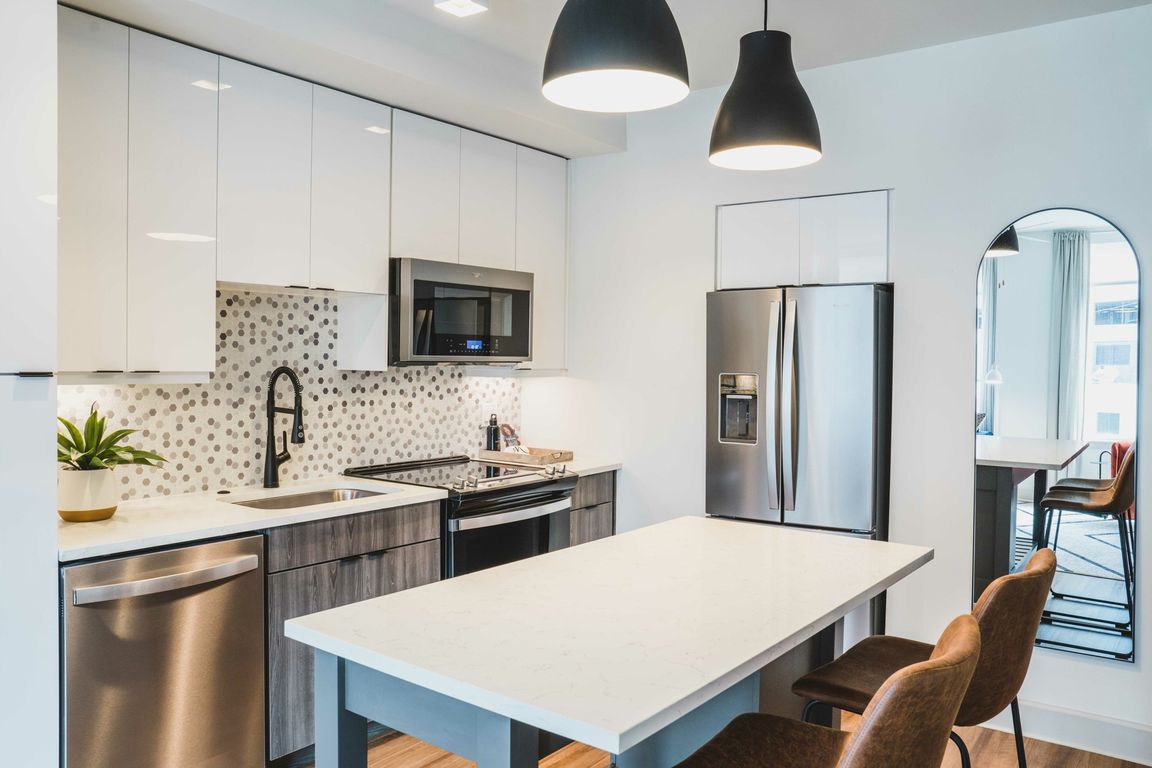 Quartz kitchen countertop with custom 42 inch cabinets