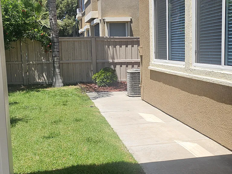 Back yard with deck view.
