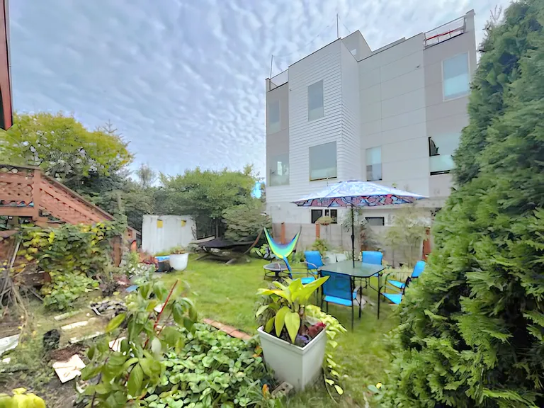 Spacious backyard shared with duplex apt tenants