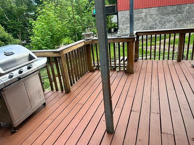 Large main deck off living room and kitchen. Gas grill ready to use at any time