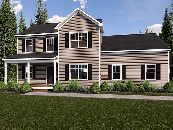 Nestled in Poplar Village, this charming two-story house features tan siding with white trim and bla