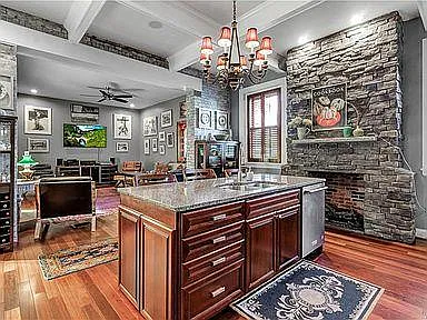 kitchen showing attached tv-room