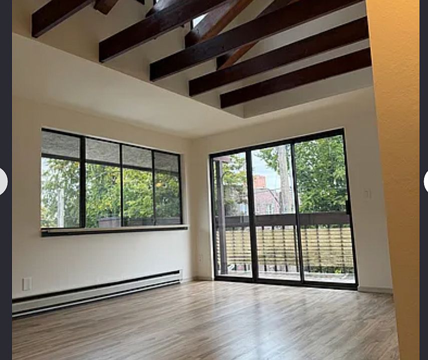 Living area with valted skylight ceiling