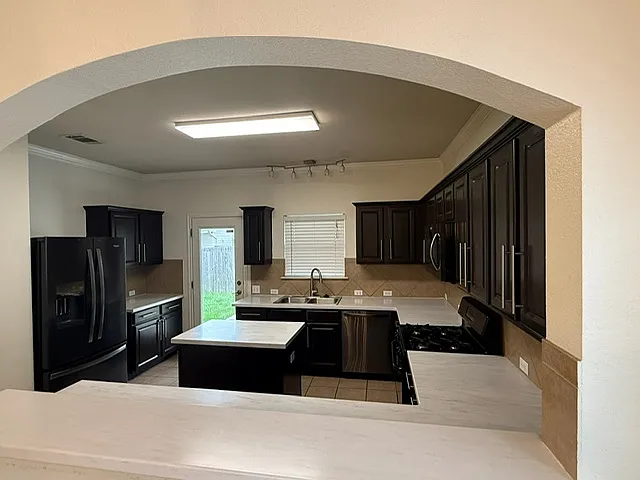 View of kitchen from dining room