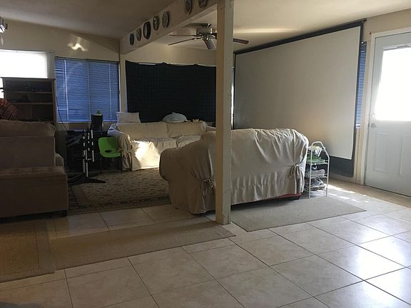 Sun room - insulated and has an AC. Big screen and projector are great for family movie nights and Wii games!