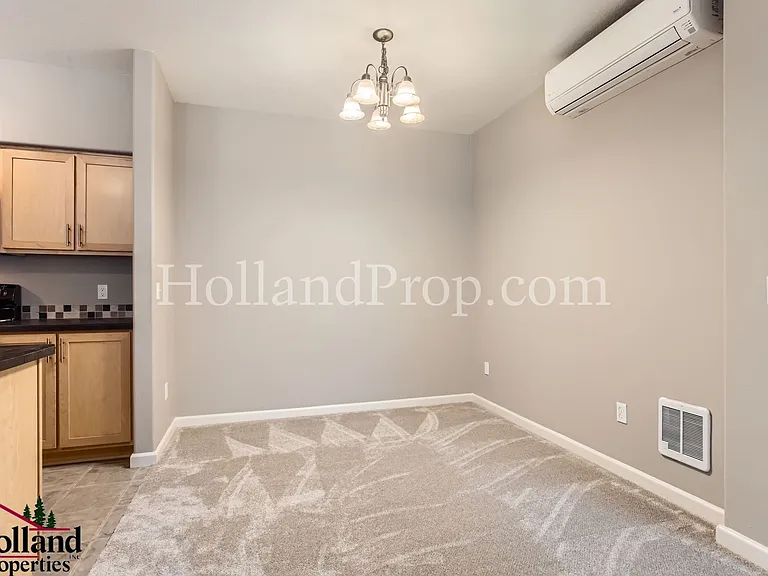 11845 NW Stone Mountain Ln #303 — Photo 4