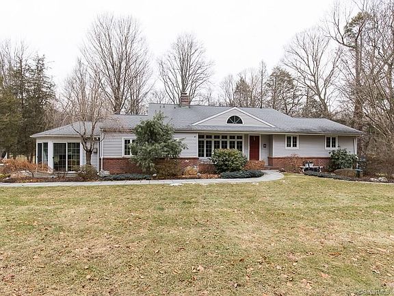 Sunroom addition, professionally landscaped grounds