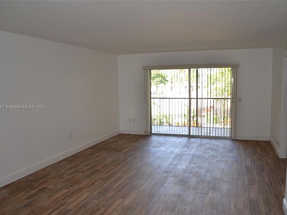 Living room with sliding doors to the balcony. 