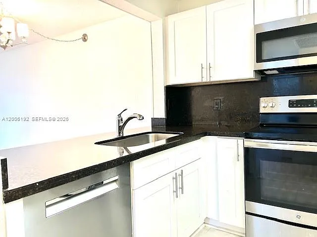 871 NE 207th Ter #4-101 — Photo 3