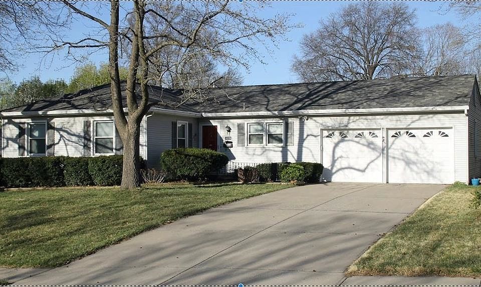 Newer roof, HVAC and fabulous family room addition with hard to find first floor laundry room in Nall Hills!