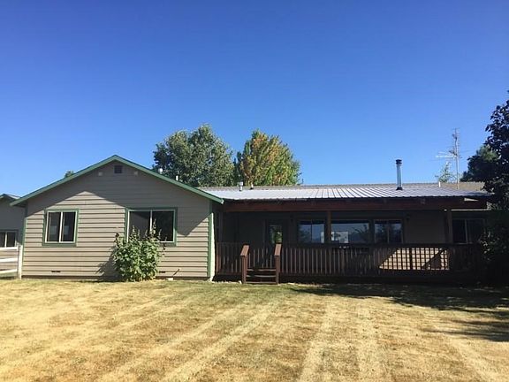 backyard and covered deck area