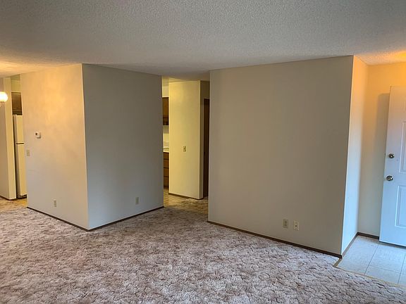 Entry living looking to kitchen