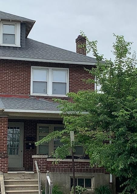 Front view of covered porch and entrance (part of planned renovations)