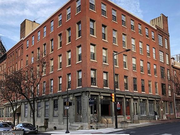 Old City Place, an historic building featuring loft style condos with exposed beams, exposed brick and huge windows