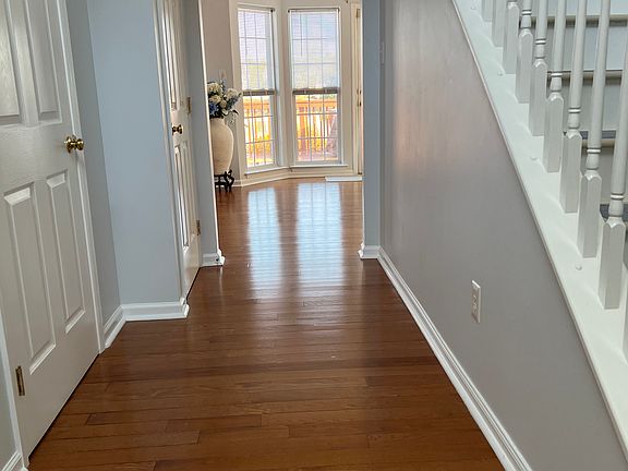 Hallway with half bathroom