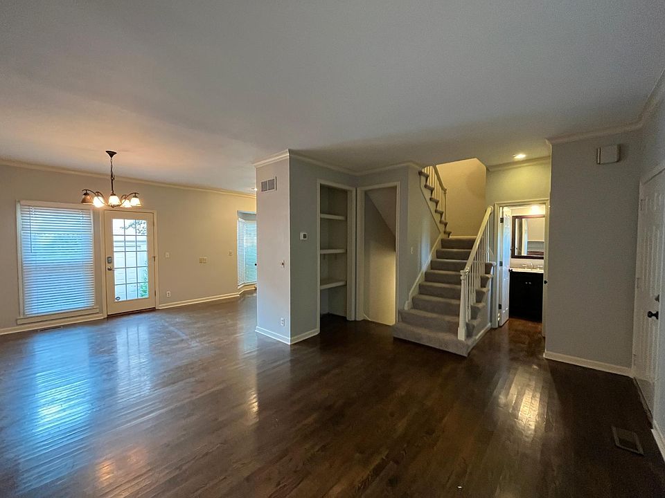 Main living area offers hardwood floors, and guest bath, dinning area leads to secluded patio, and eat-in kitchen