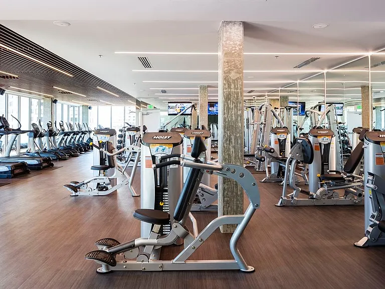 Fitness center with cardio and strength equipment.