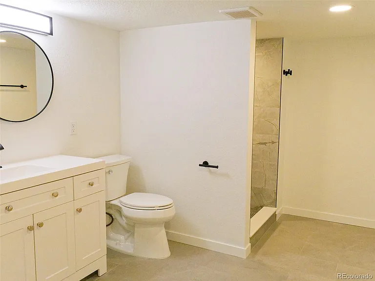 5927 S Yates Ct — Photo 23