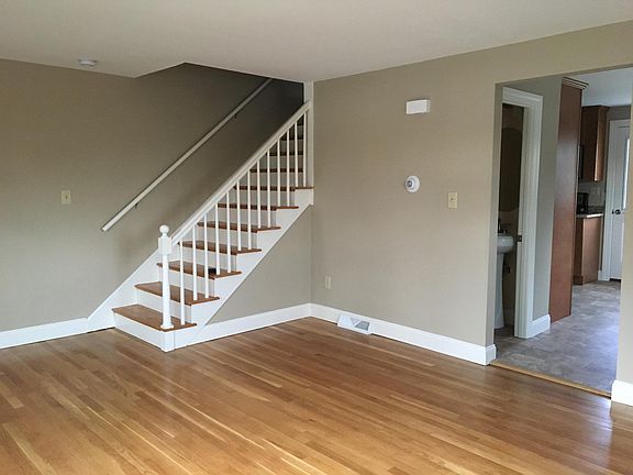 hardwood stairs leading to 2nd floor