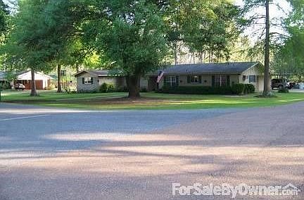 Large, shaded corner lot.
