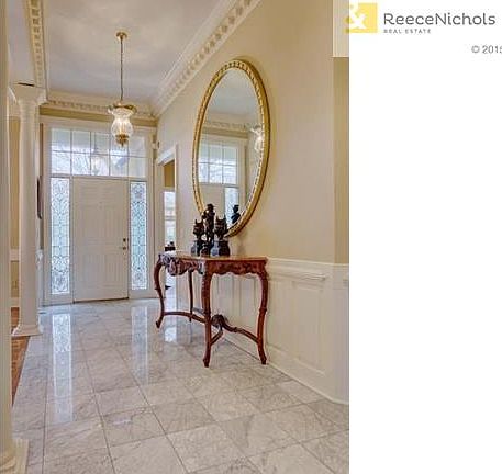 Beautiful marble floor upon entry and detailed woodwork!