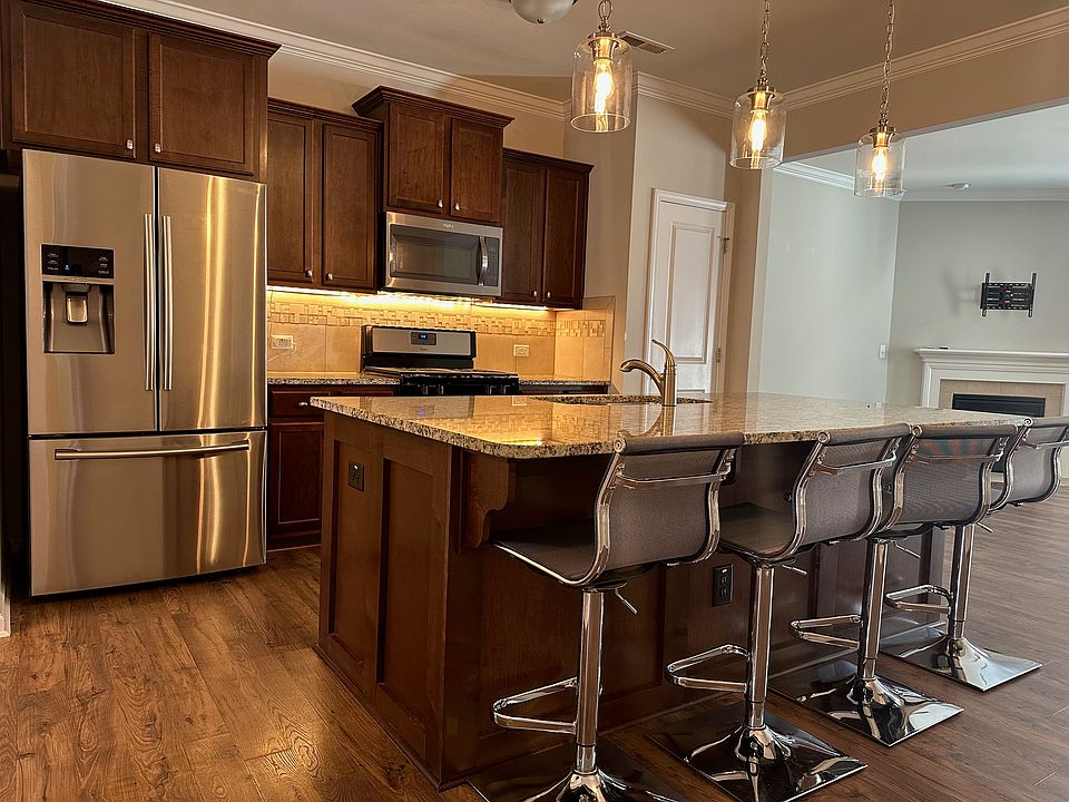 Large kitchen island with barstools