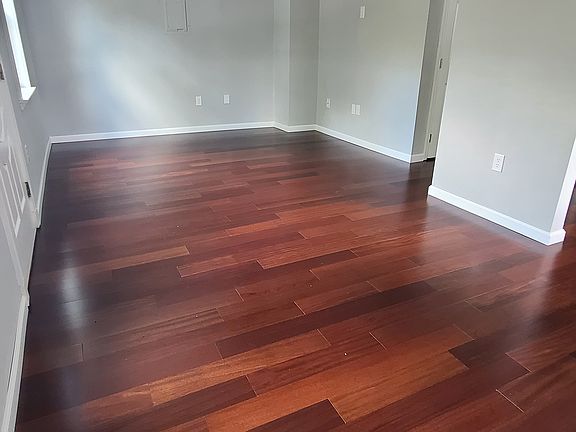 Spacious living / dining area; new hardwood floors throughout