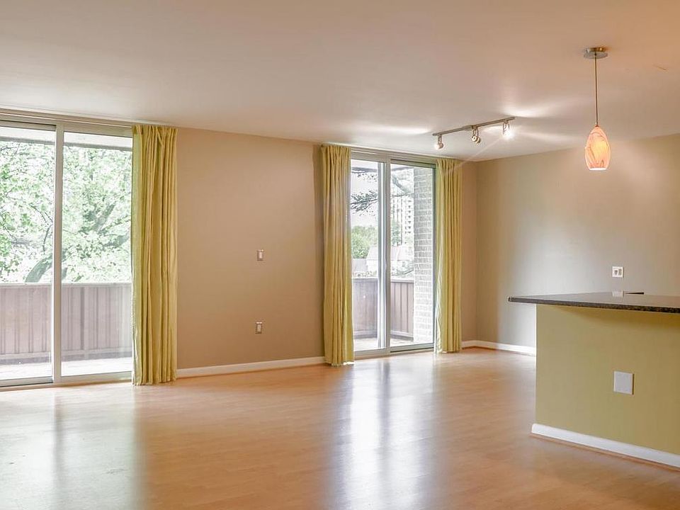 Living room with large windows and plenty of natural lighting