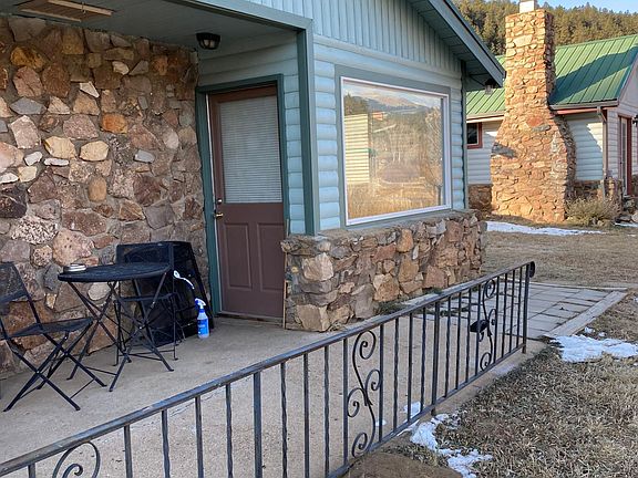 Home is one 1/2 of a duplex. This is a shared front patio as well as the front door to unit.