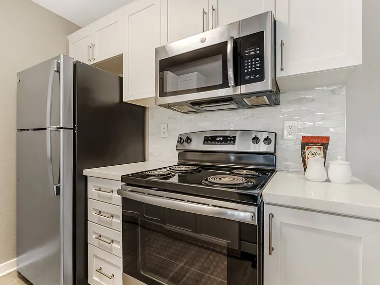 Our renovated kitchens come complete with stainless steel appliances, including a refrigerator, microwave, dishwasher, and in-unit washer/dryer for your convenience.