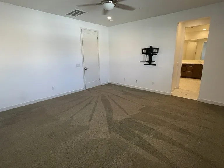 3rd floor - Primary bedroom with bathroom, large walk in closet with built in storage cabinets