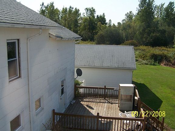 Deck, and woods behind