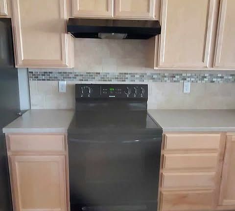kitchen stove and cabinets