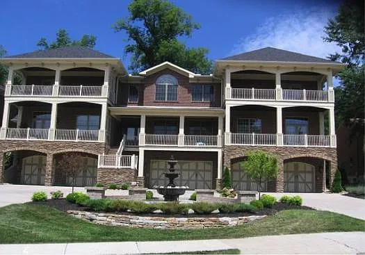 Common area with fountain. Half Circle driveway is shared by 4 units. Each unit includes a 2 car garage, plus room for at least 2 cars in their private driveway. Street parking available for additional guests. All exterior maintenance is covered by HOA