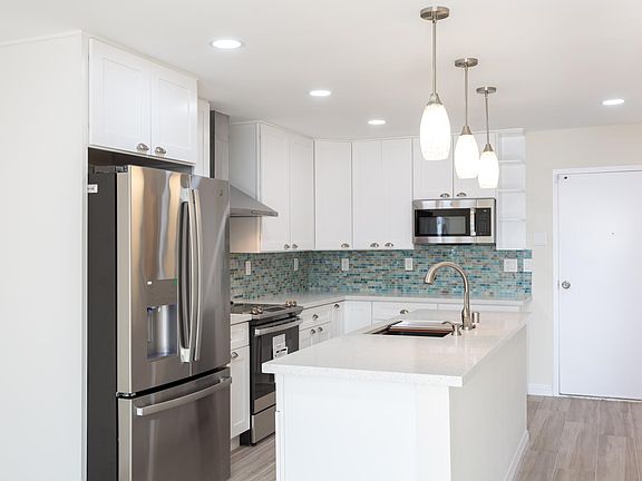 All new appliances including a Bosch dishwasher in the island.