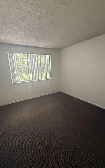 8741 Wiles Rd #305 — Photo 16