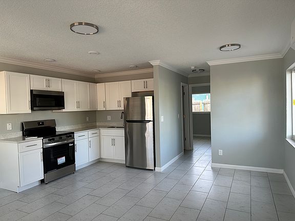 Open Living, Dining, and Kitchen
