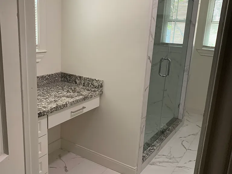 Primary Bathroom Built-in Vanity and Walk-in Shower