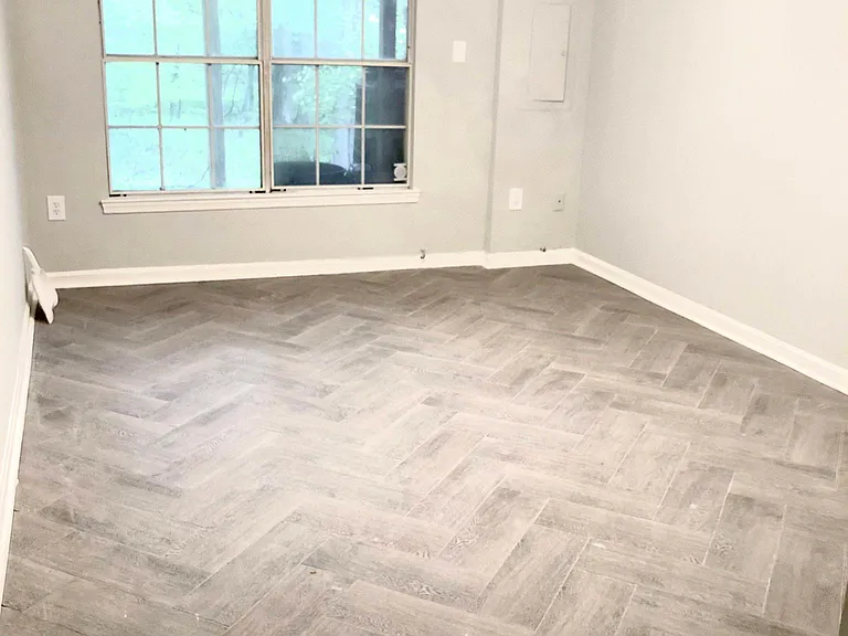 Basement bedroom 2 w/ herringbone floors