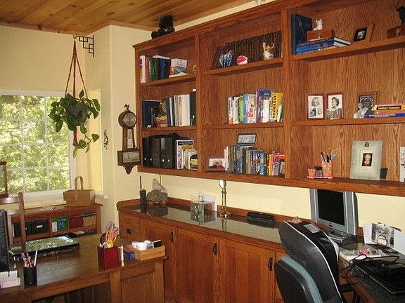 den with built in cabinets