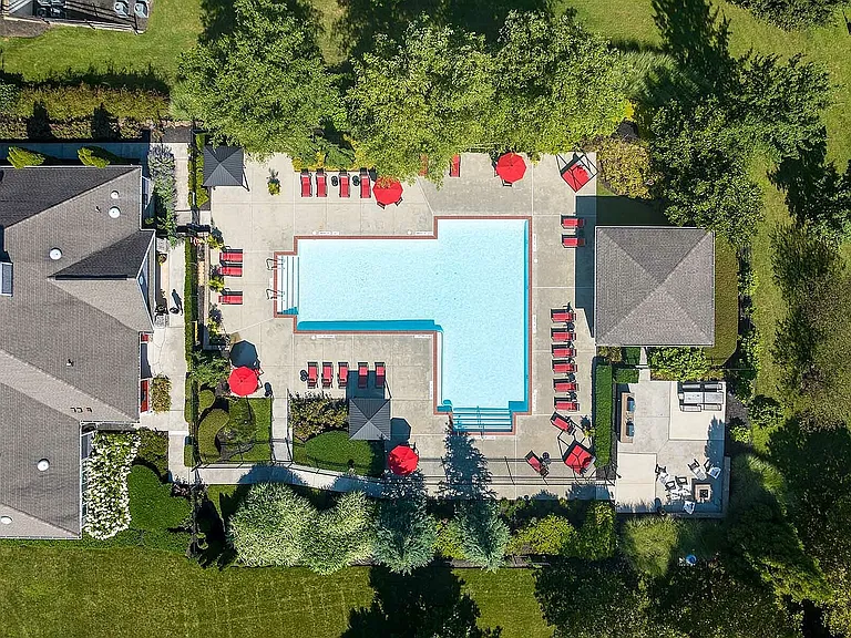 Experience serene relaxation at this lavish poolside oasis.
