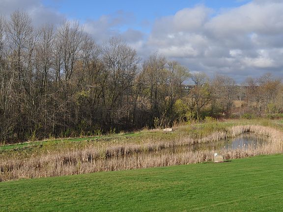 Wonderful views overlooking a pond and conservancy.