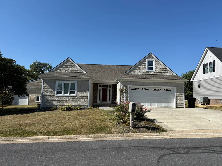 Front of house. This is a two car garage.