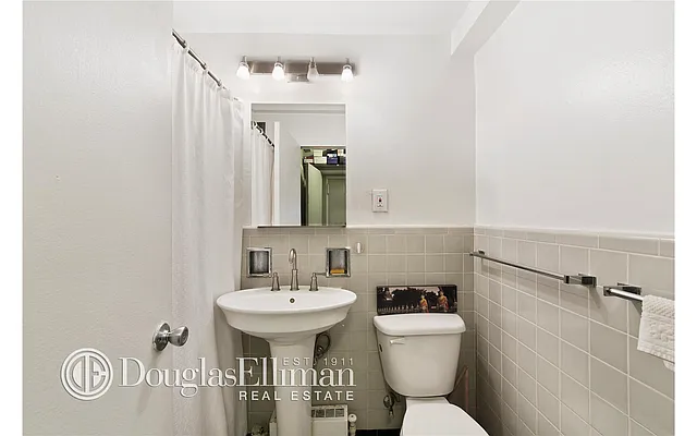 Sold by Douglas Elliman | media 11