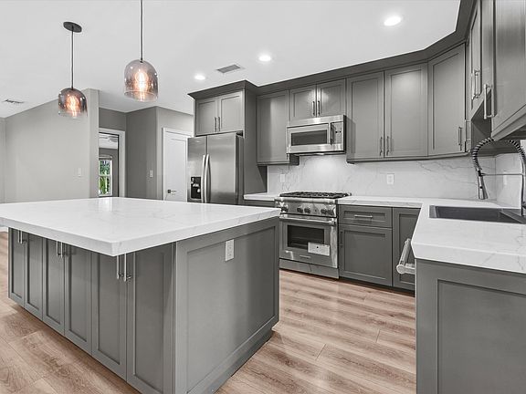 Modern kitchen with shaker cabinets and soft-close drawers