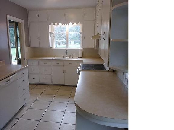 Kitchen overlooking the backyard