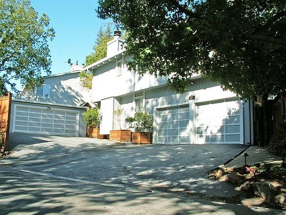 Two separate 2-car garages
