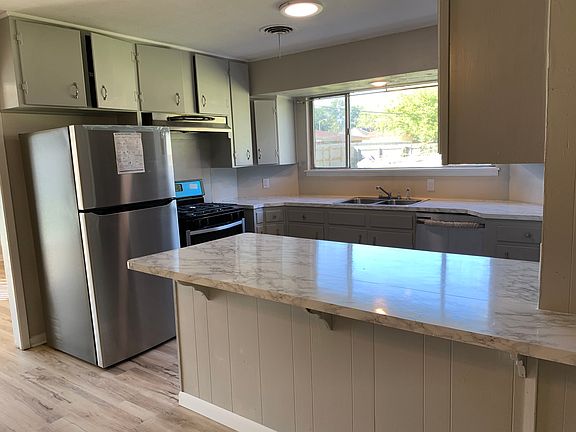 Open-concept kitchen renovated in 2020. Plenty of natural light.